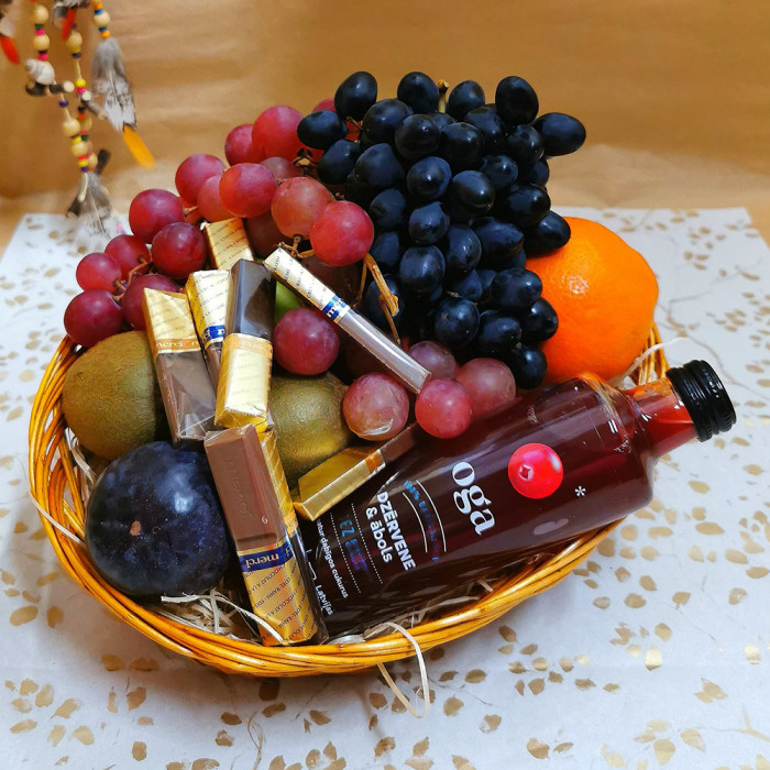 Gift basket with fruit, juice and chocolates