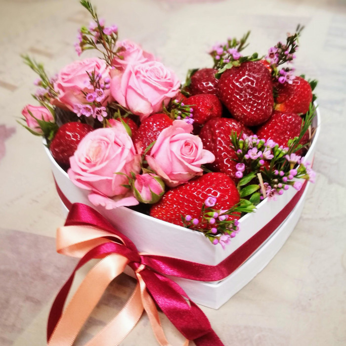 Box with strawberries in the shape of heart