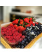 Berry basket with strawberries, blueberries and raspberries